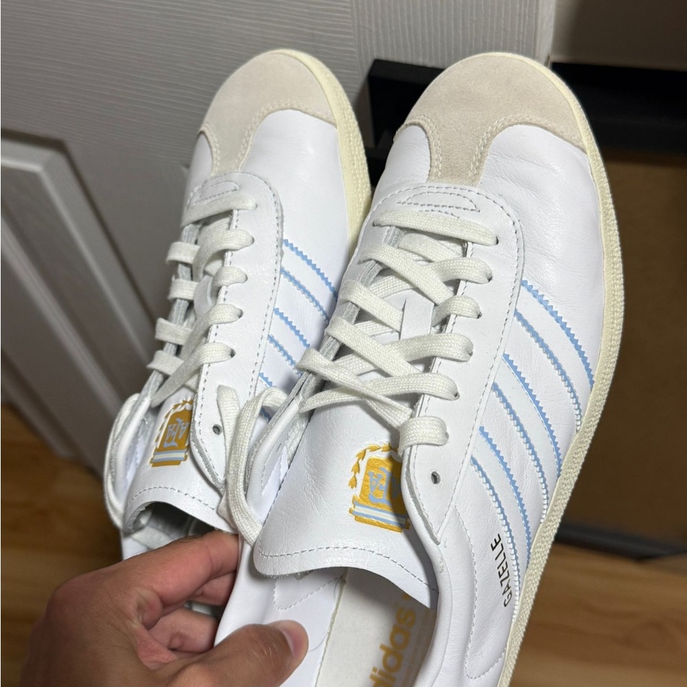 Adidas White and Cream Sneakers with Blue Stripes